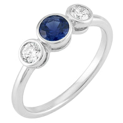Anello in oro con pietre preziose lunetta con diamanti e zaffiro 3 pietre 1.50 carati