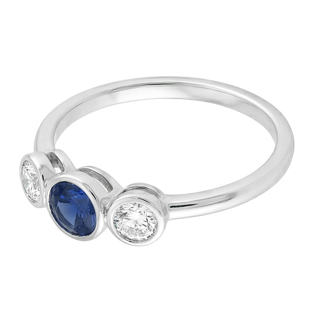 Anello in oro con pietre preziose lunetta con diamanti e zaffiro 3 pietre 1.50 carati