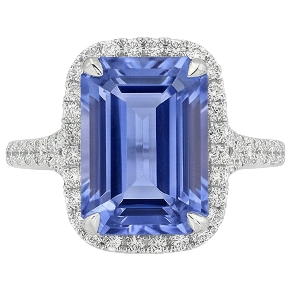 Anello in oro con tanzanite a forma di smeraldo da 8.75 ct con diamanti rotondi