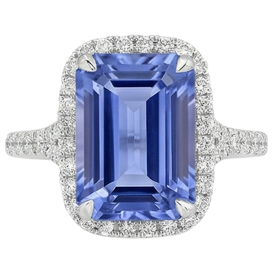 Anello in oro con tanzanite a forma di smeraldo da 8.75 ct con diamanti rotondi