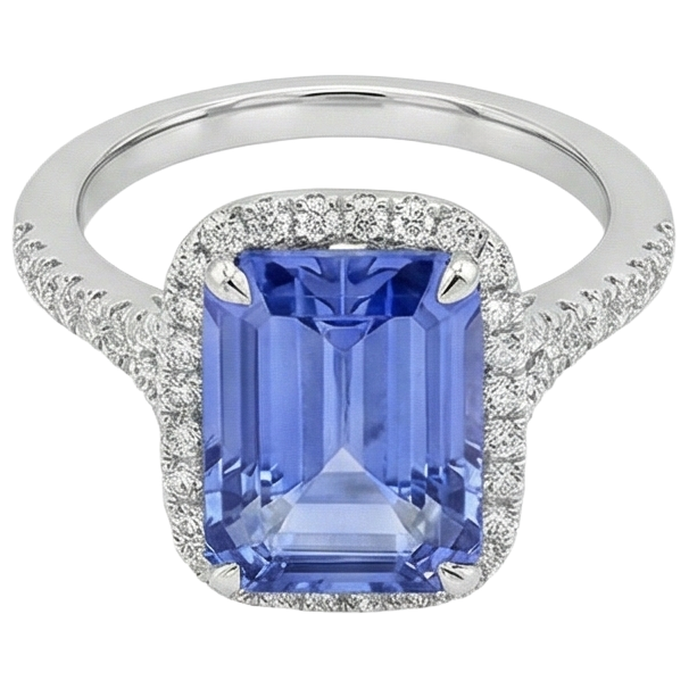 Anello in oro con tanzanite a forma di smeraldo da 8.75 ct con diamanti rotondi