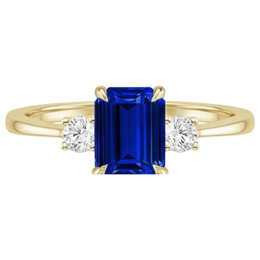 Anello in oro giallo con 3 pietre di smeraldo. zaffiro blu e diamante 3.50 carati