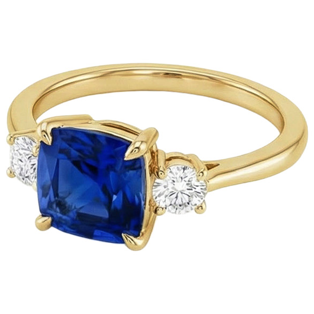 Anello in oro giallo con 3 pietre. diamante e cuscino. zaffiro blu 2.50 carati
