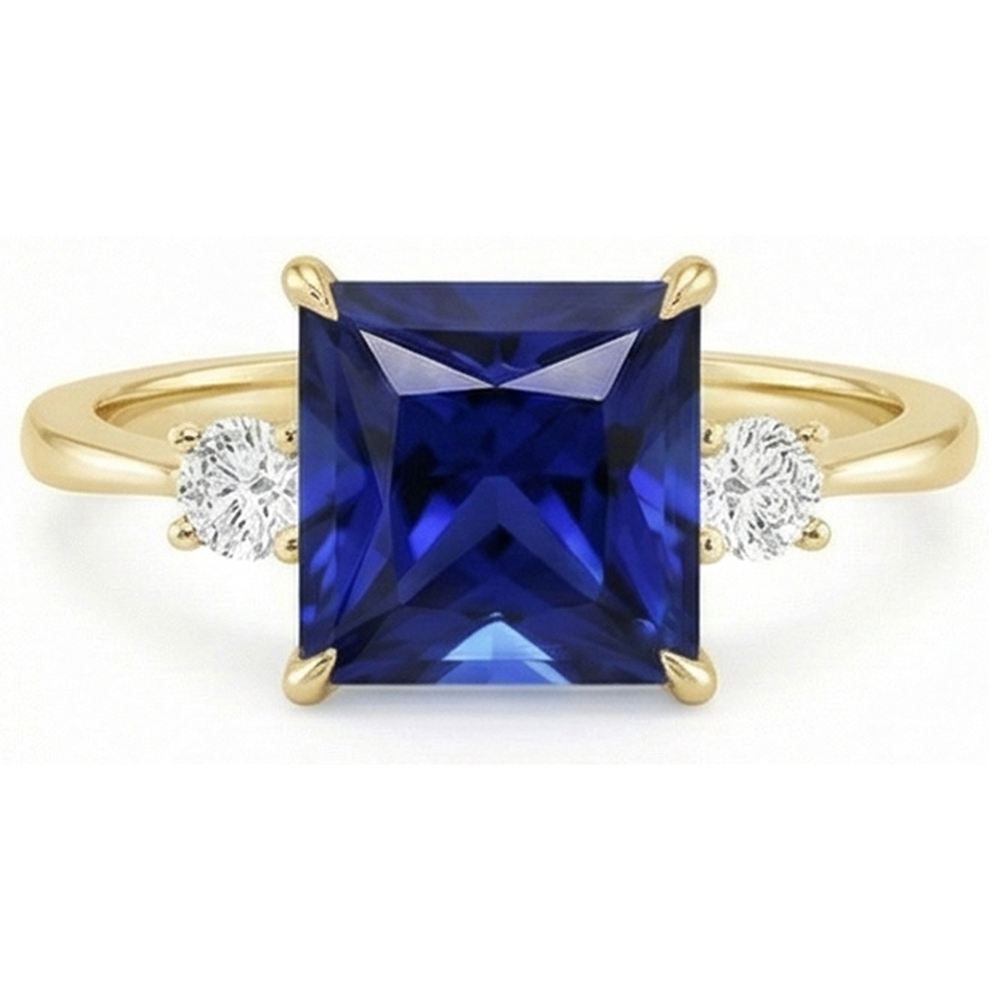 Anello in oro giallo con 3 pietre. zaffiro blu principessa e diamanti 5.25 carati