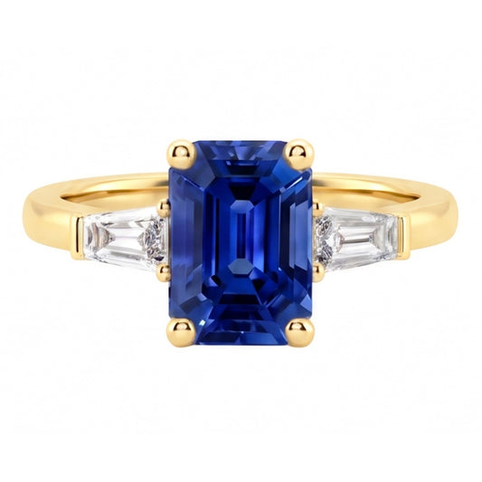 Anello in oro giallo con tre pietre e zaffiro blu smeraldo 2.50 carati