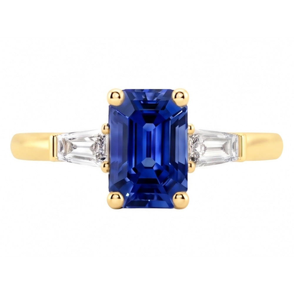 Anello in oro giallo con tre pietre e zaffiro blu smeraldo 2.50 carati