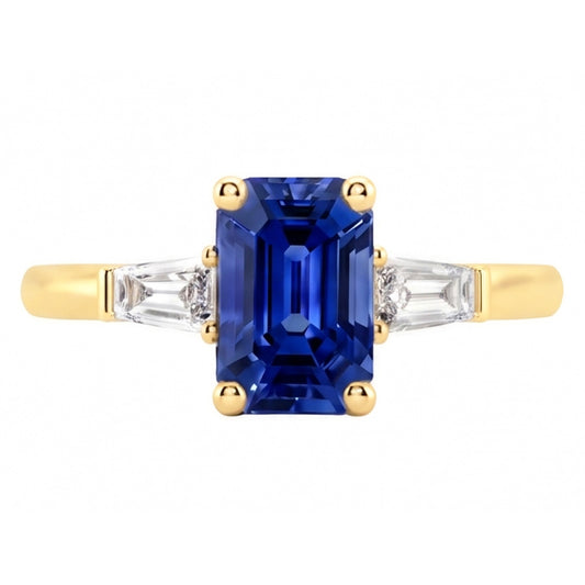 Anello in oro giallo con tre pietre e zaffiro blu smeraldo 2.50 carati
