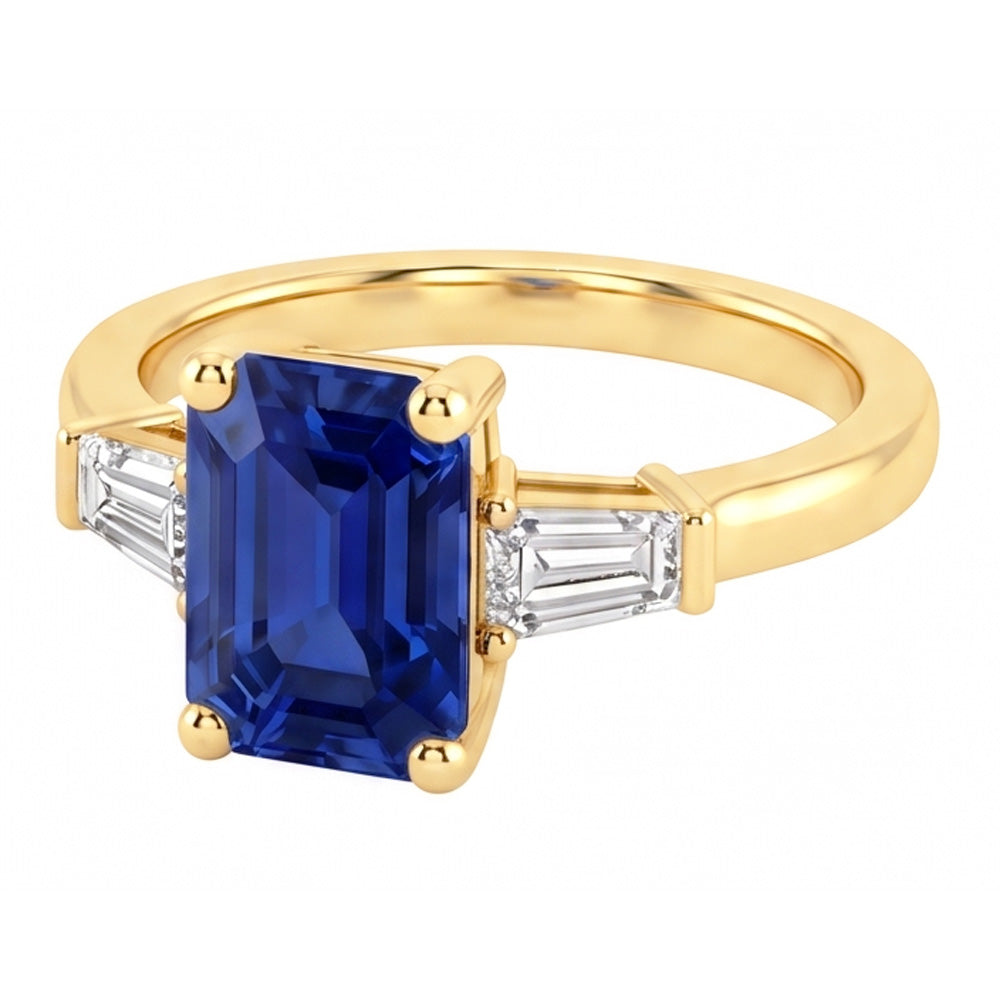 Anello in oro giallo con tre pietre e zaffiro blu smeraldo 2.50 carati