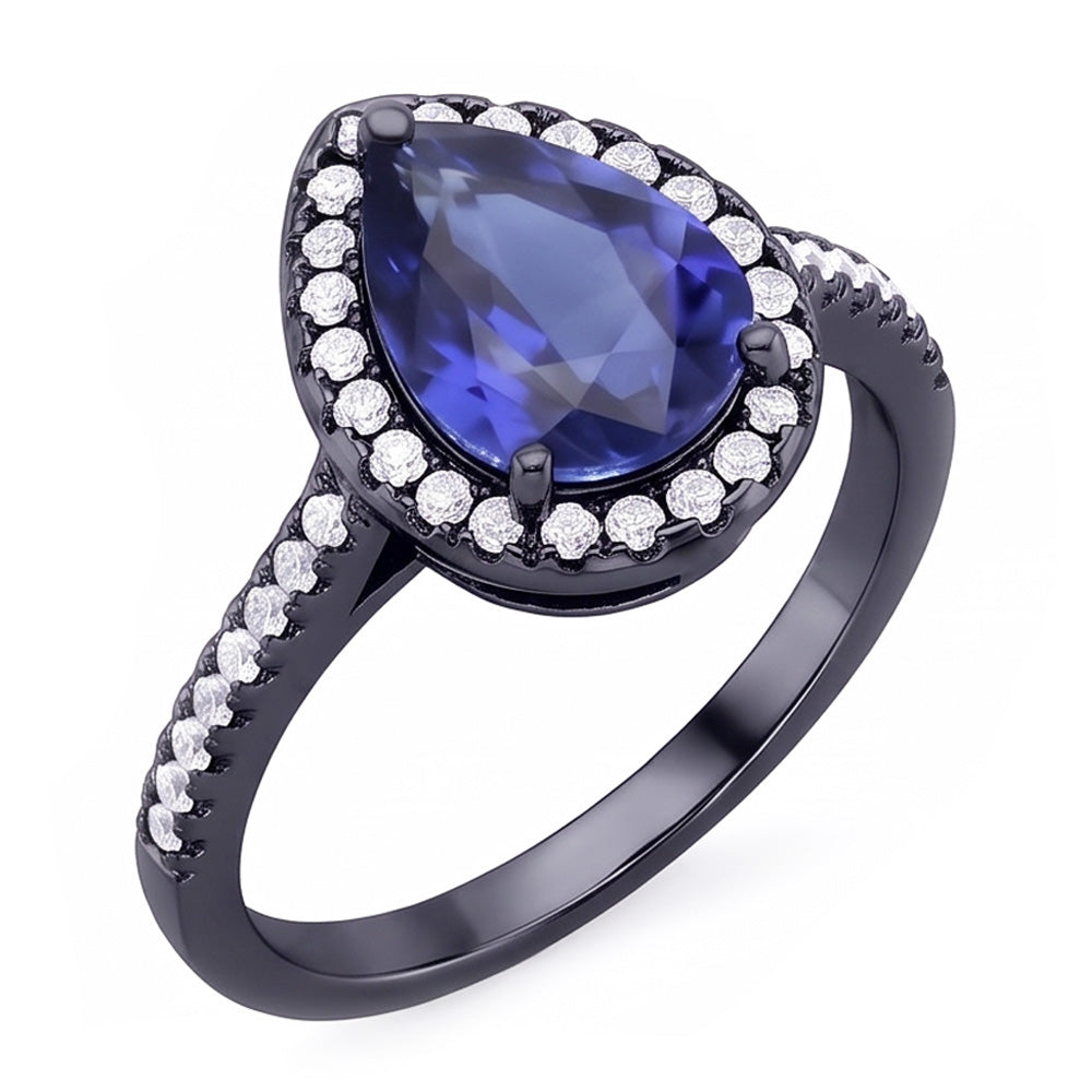 Anello in oro nero a forma di pera con alone zaffiro blu e diamanti 4 carati