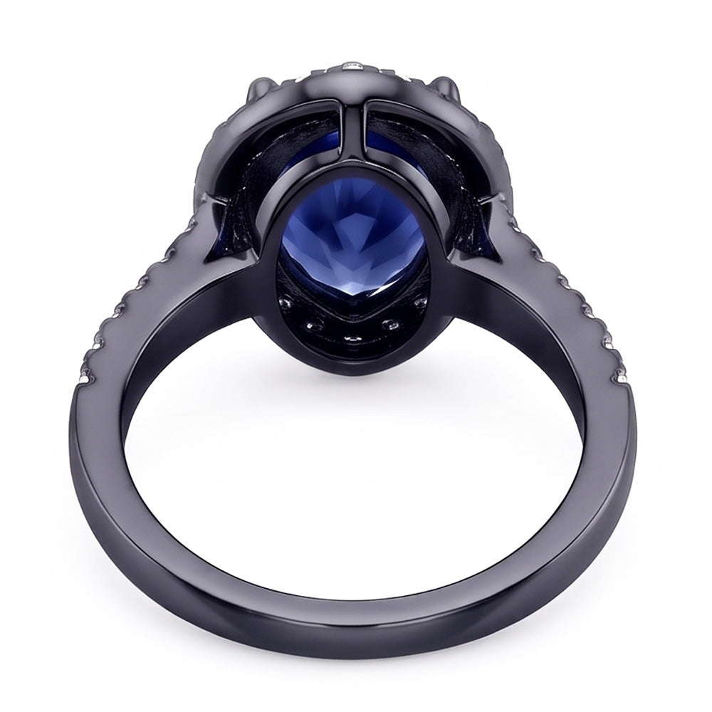 Anello in oro nero a forma di pera con alone zaffiro blu e diamanti 4 carati