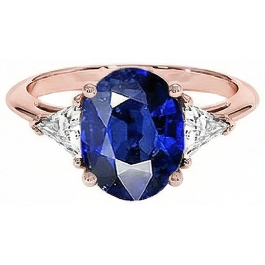Anello in oro rosa con 3 pietre. zaffiro blu ovale e diamante 8.25 carati
