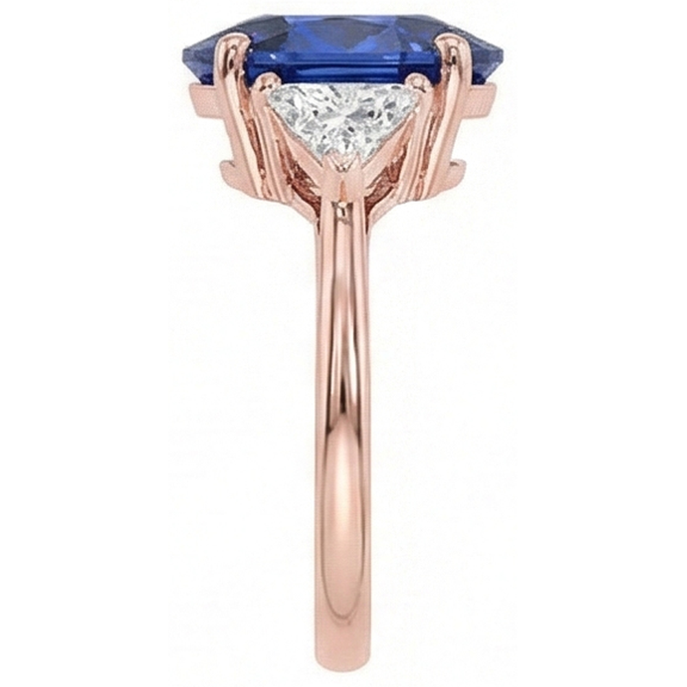 Anello in oro rosa con 3 pietre. zaffiro blu ovale e diamante 8.25 carati