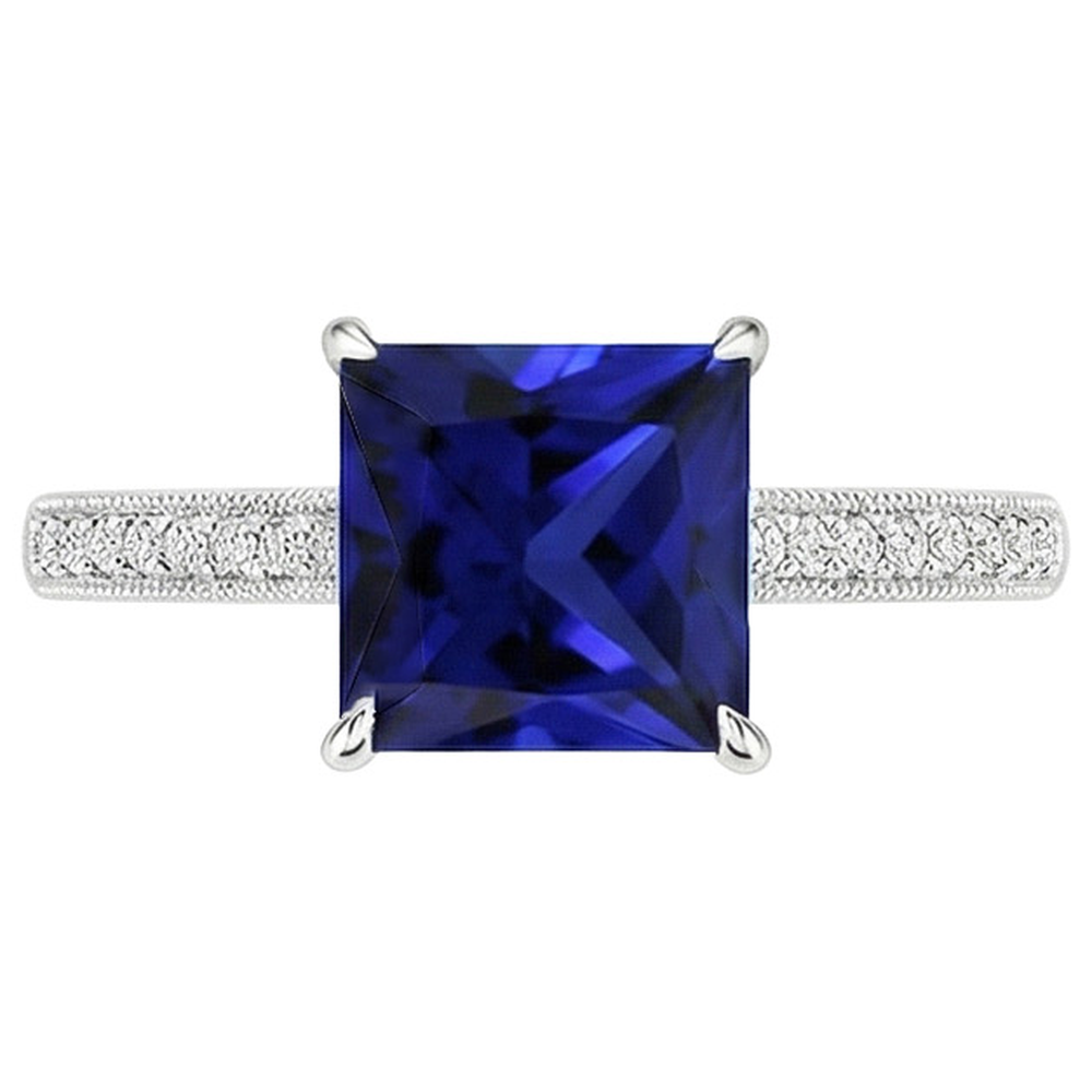 Anello in oro stile antico con diamanti e zaffiri blu principessa 4.50 carati