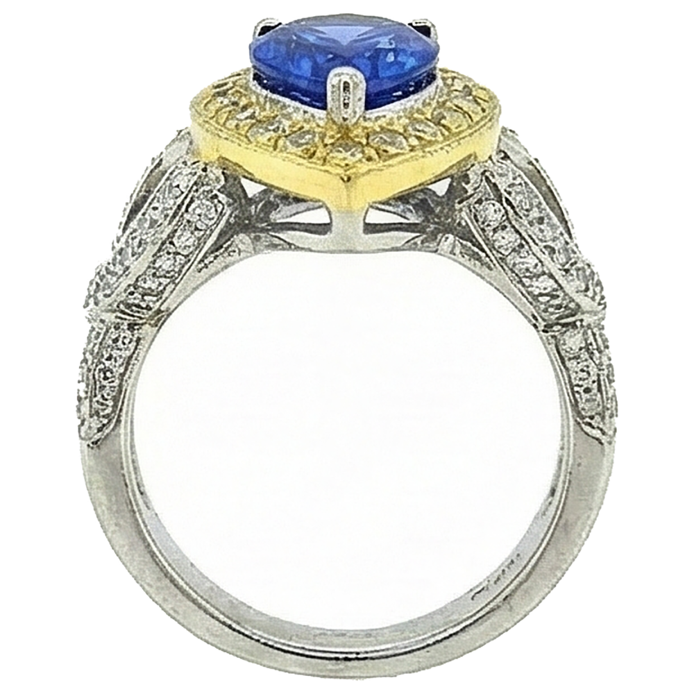 Anello in stile antico con tanzanite a pera e diamanti da 4,51 ct in oro bicolore