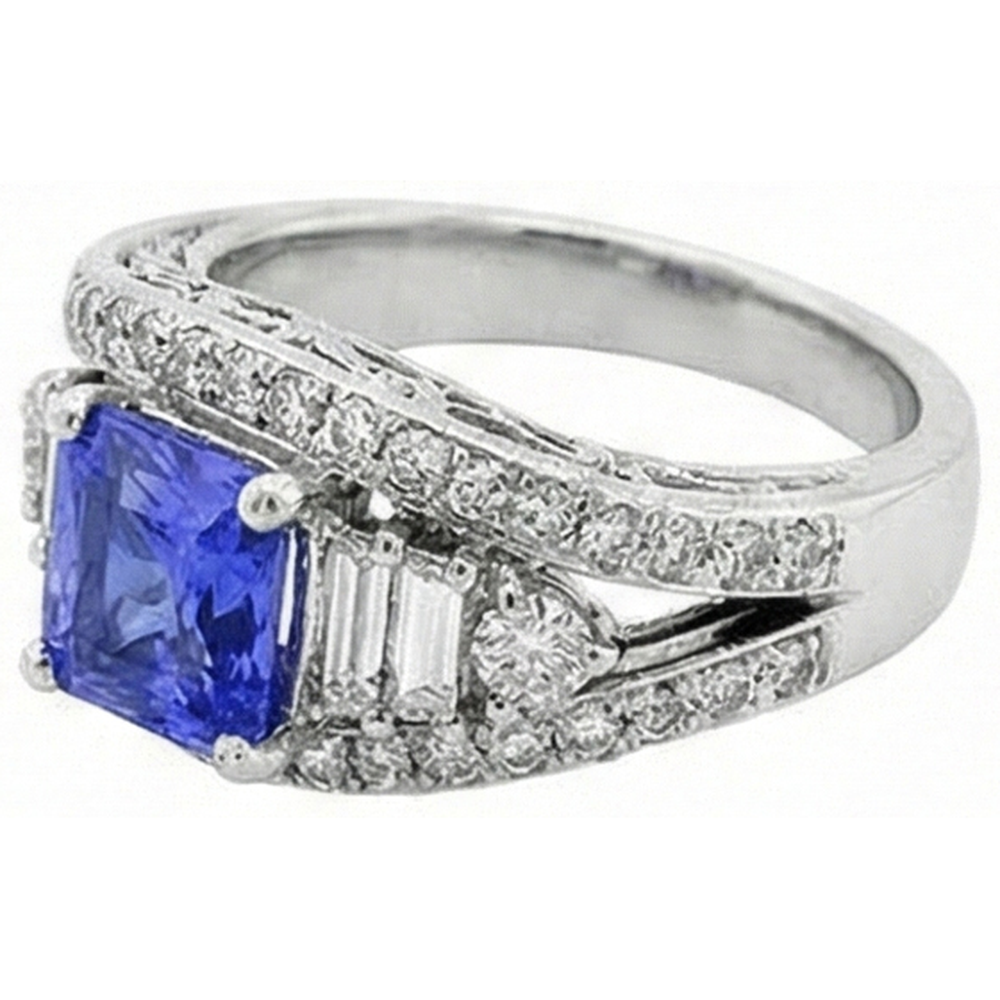 Anello in zaffiro con diamante rotondo. occhiello aperto. gambo diviso. 2.50 carati