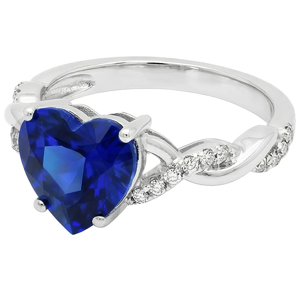 Anello intrecciato con zaffiro blu da 3,50 carati e pietra preziosa con diamanti a cuore