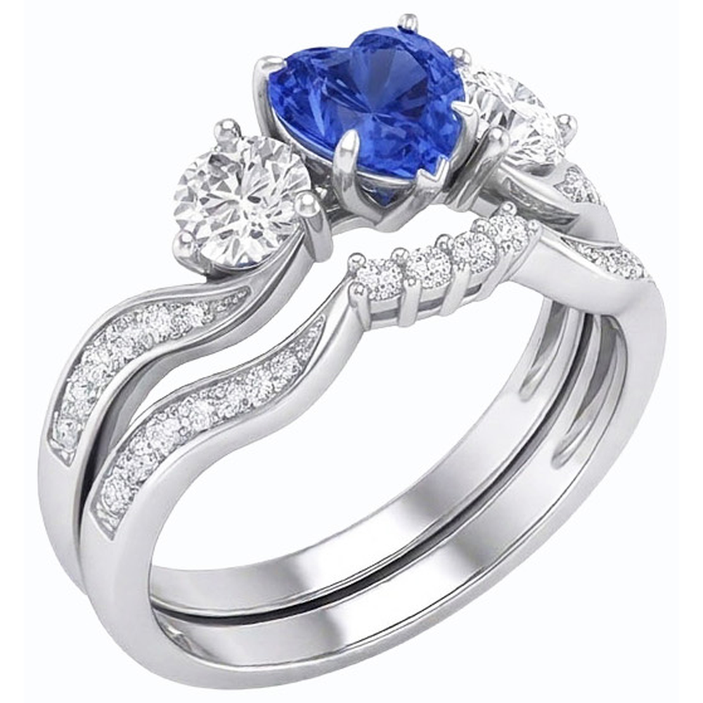 Anello nuziale con 3 pietre incastonato con zaffiro blu a cuore e diamanti rotondi 3 carati