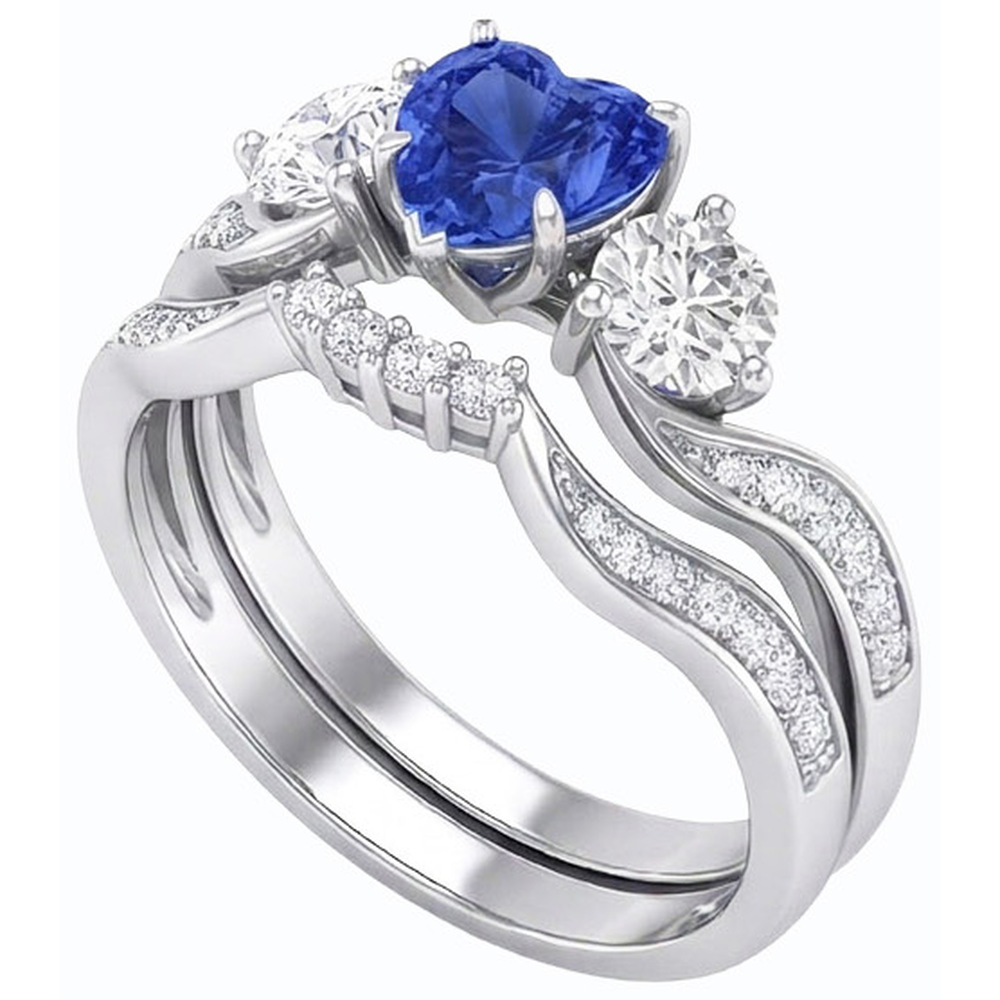 Anello nuziale con 3 pietre incastonato con zaffiro blu a cuore e diamanti rotondi 3 carati