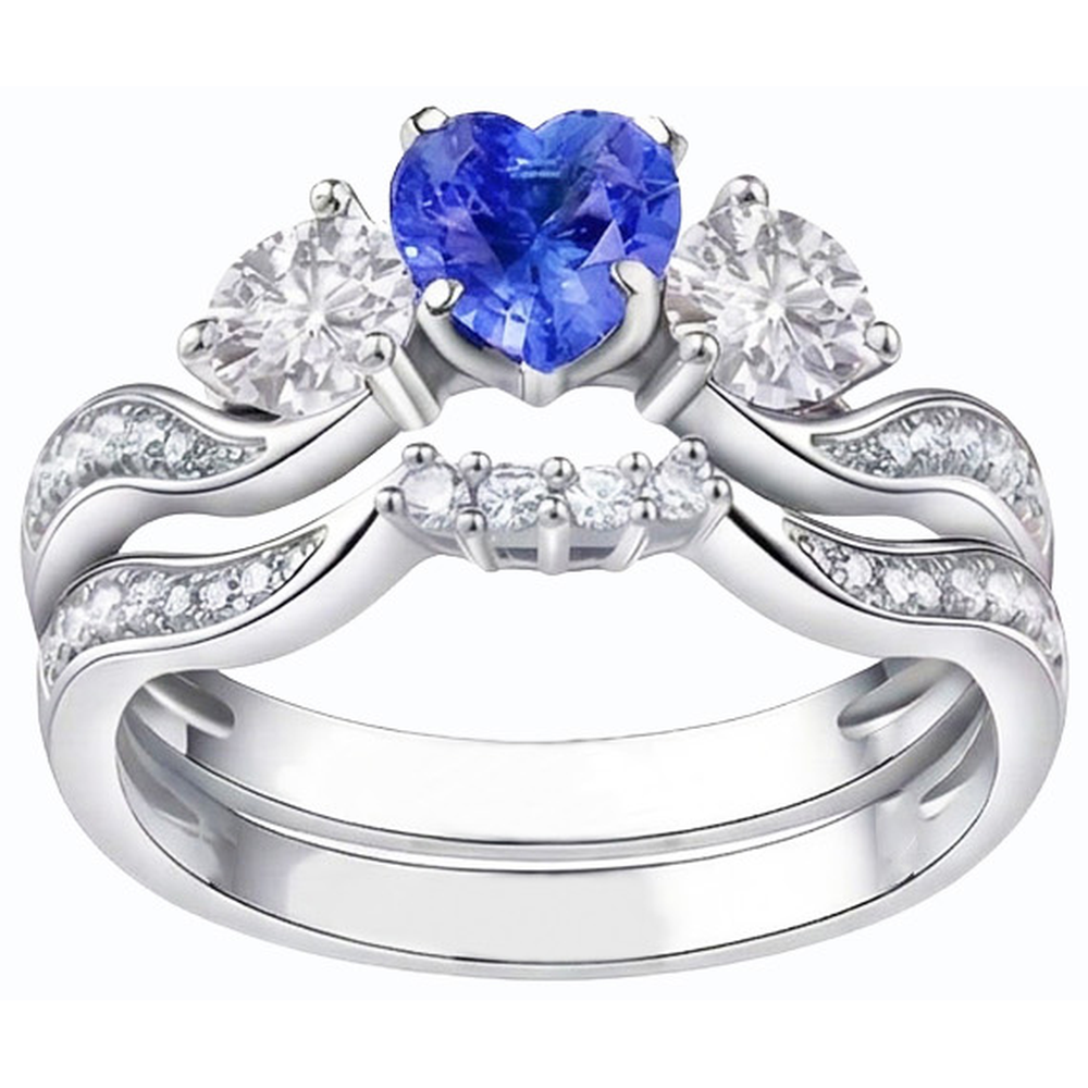 Anello nuziale con 3 pietre incastonato con zaffiro blu a cuore e diamanti rotondi 3 carati