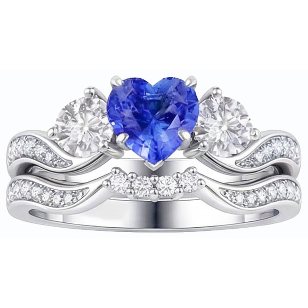 Anello nuziale con 3 pietre incastonato con zaffiro blu a cuore e diamanti rotondi 3 carati