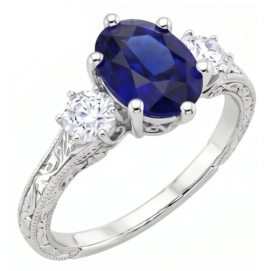 Anello old style con zaffiro blu 2,50 carati e diamanti 3 pietre in oro bianco 14K