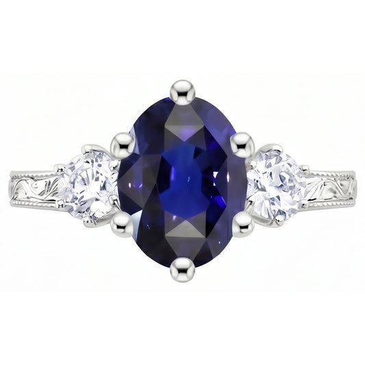 Anello old style con zaffiro blu 2,50 carati e diamanti 3 pietre in oro bianco 14K