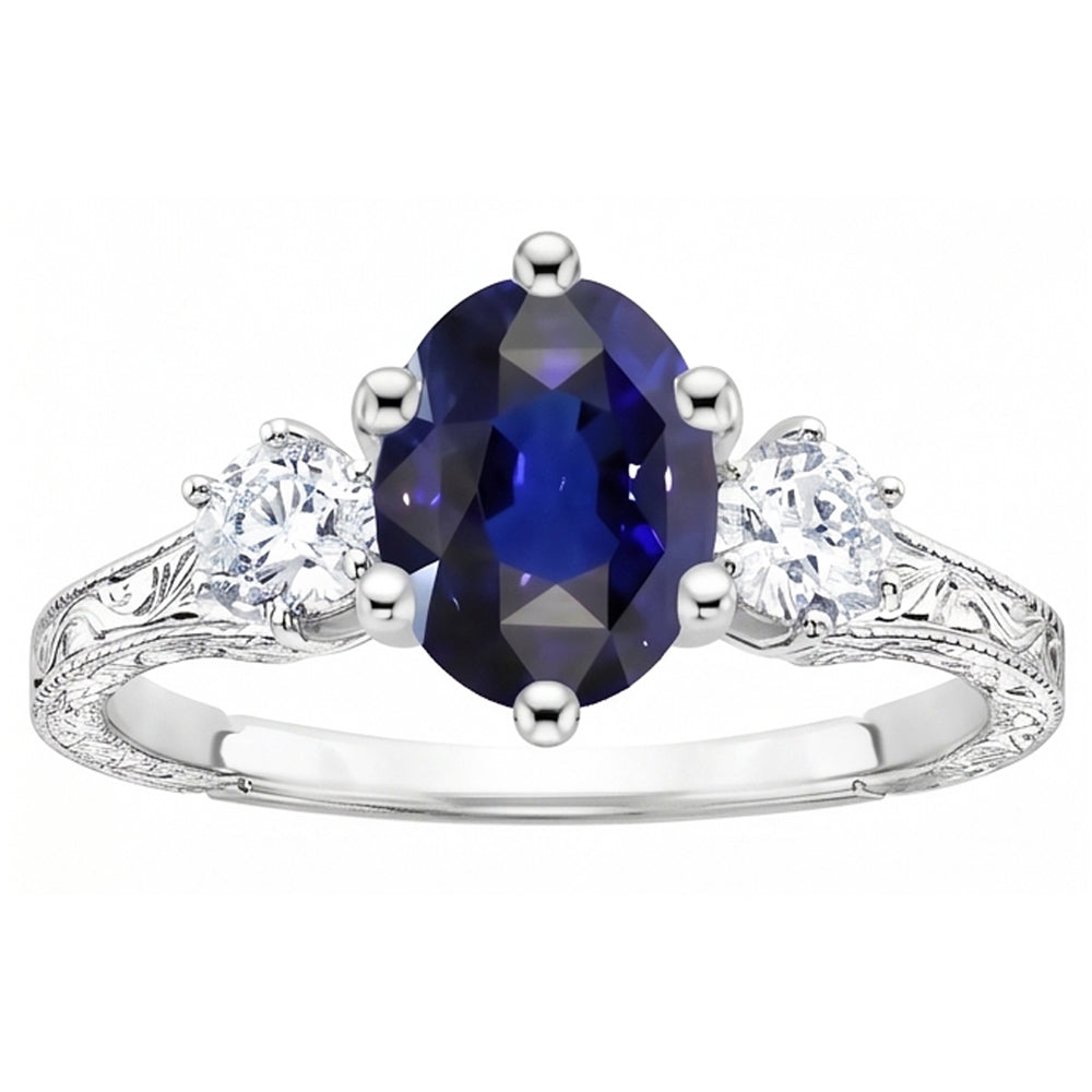 Anello old style con zaffiro blu 2,50 carati e diamanti 3 pietre in oro bianco 14K