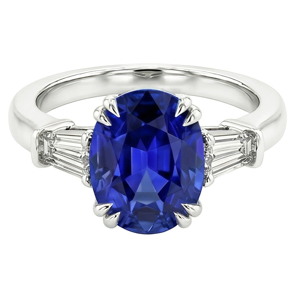 Anello ovale con tre pietre di zaffiro blu con diamante baguette 3.25 carati