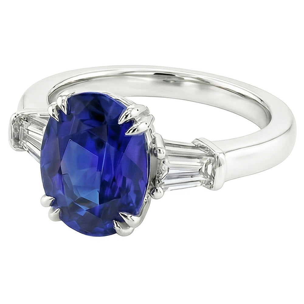 Anello ovale con tre pietre di zaffiro blu con diamante baguette 3.25 carati