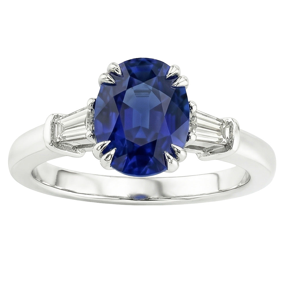 Anello ovale con tre pietre di zaffiro blu con diamante baguette 3.25 carati