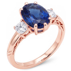 Anello ovale con tre pietre di zaffiro blu e diamanti 2.50 carati