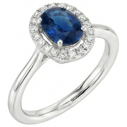 Anello ovale con zaffiro di Ceylon e diamanti rotondi 2.50 carati in oro bianco 14K
