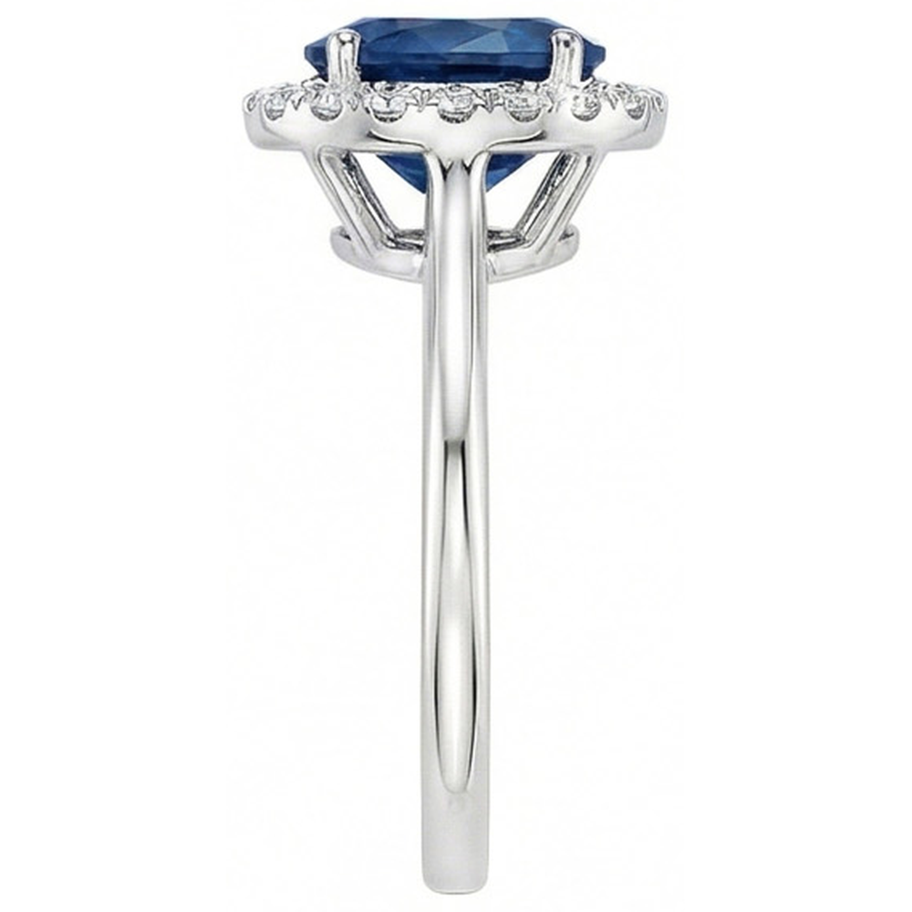 Anello ovale con zaffiro di Ceylon e diamanti rotondi 2.50 carati in oro bianco 14K