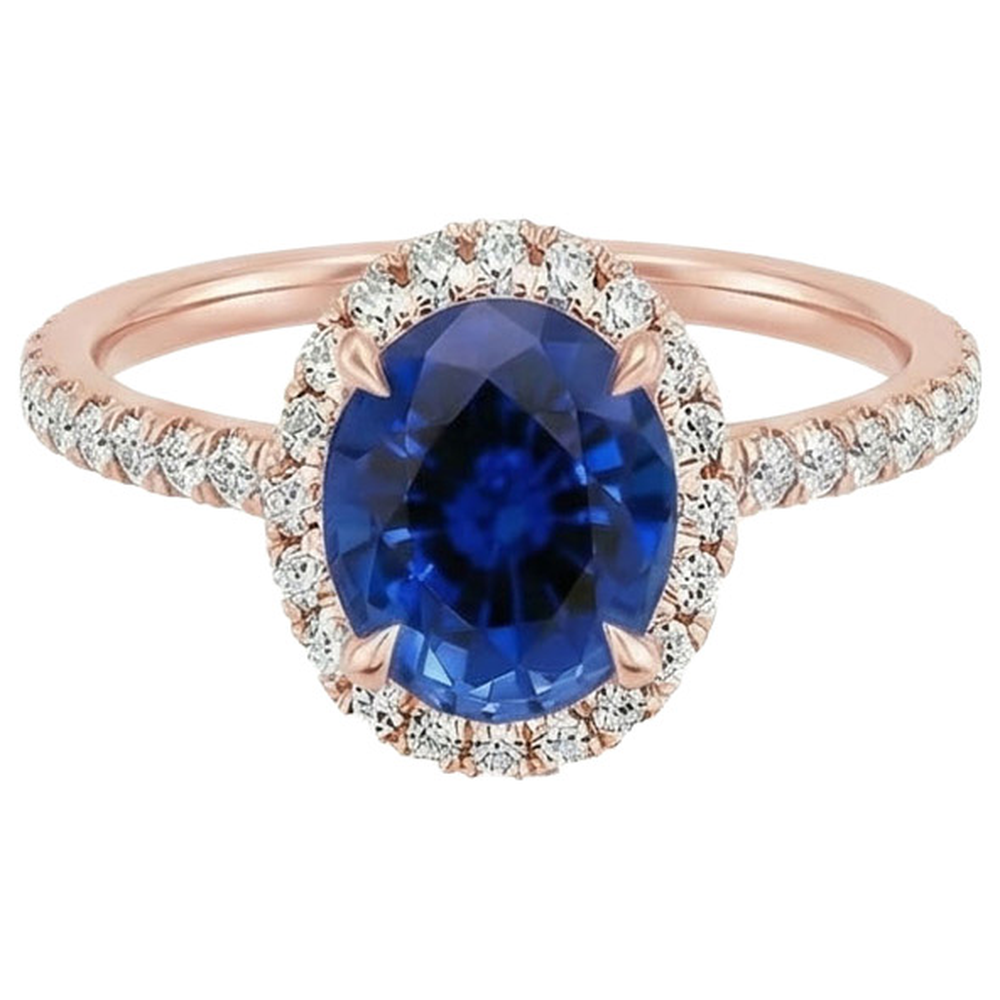 Anello ovale con zaffiro e diamanti. 8 carati. gioielli in oro rosa 14K