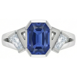 Anello radiante con 3 pietre preziose. 2.50 carati. incastonato di diamanti baguette