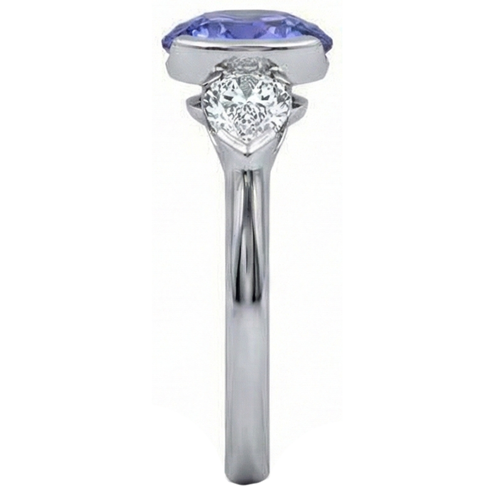 Anello scintillante con 3 pietre ovale con tanzanite e diamante a pera da 3 carati