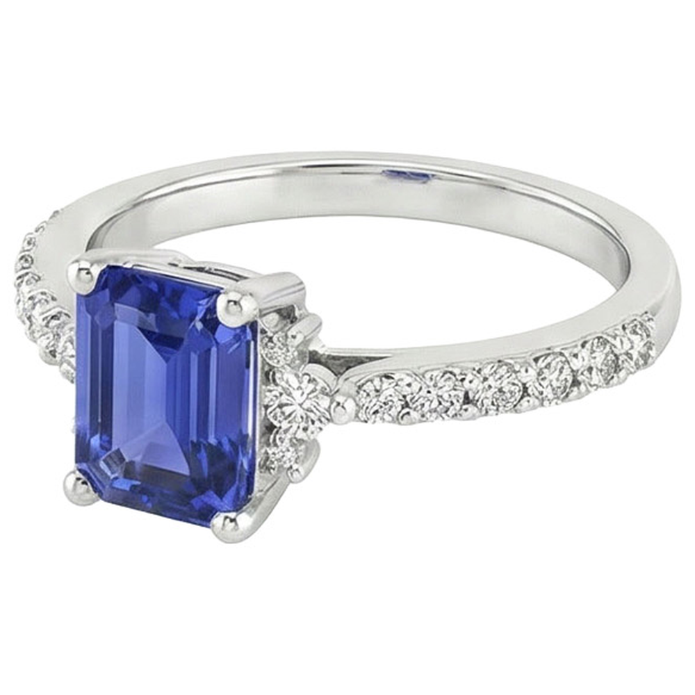 Anello solitario accenti zaffiro blu e diamante 4 carati taglio smeraldo