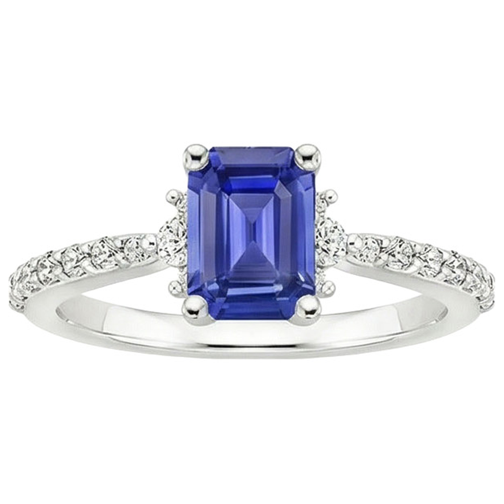 Anello solitario accenti zaffiro blu e diamante 4 carati taglio smeraldo