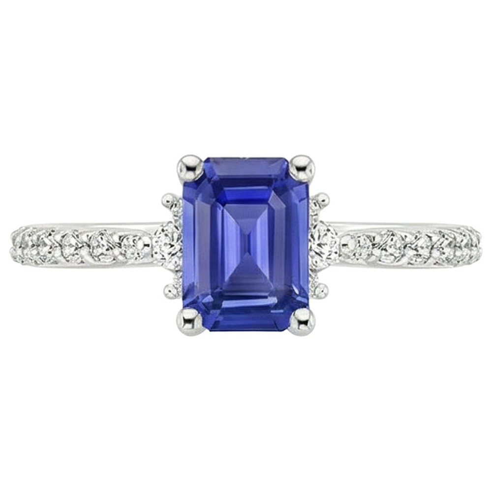 Anello solitario accenti zaffiro blu e diamante 4 carati taglio smeraldo