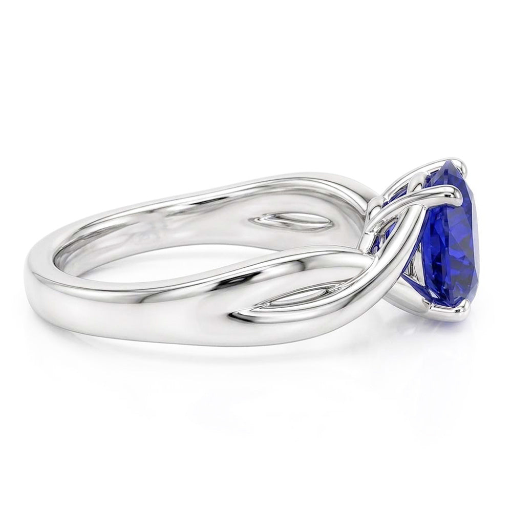 Anello solitario con gemma blu zaffiro 2 carati con gambo intrecciato