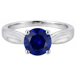 Anello solitario con gemme tonde. Zaffiro di Ceylon da 1 carati e stelo Milgrain in oro bianco 14K