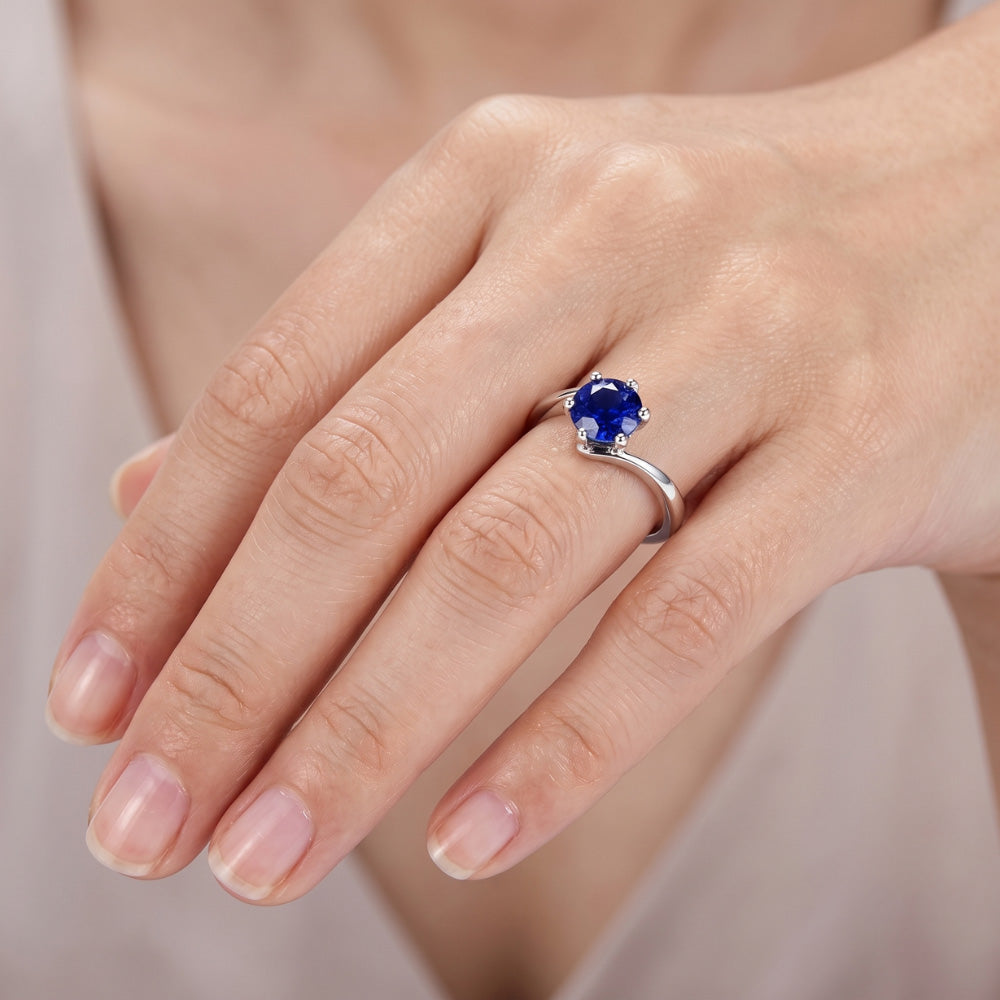 Anello solitario con pietre preziose. zaffiro blu di Ceylon. 1 carato. stile a tensione