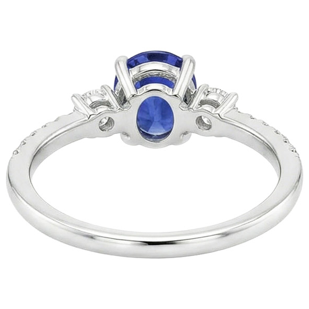 Anello solitario con zaffiro blu 3,50 carati e diamanti tondi in oro bianco 14K