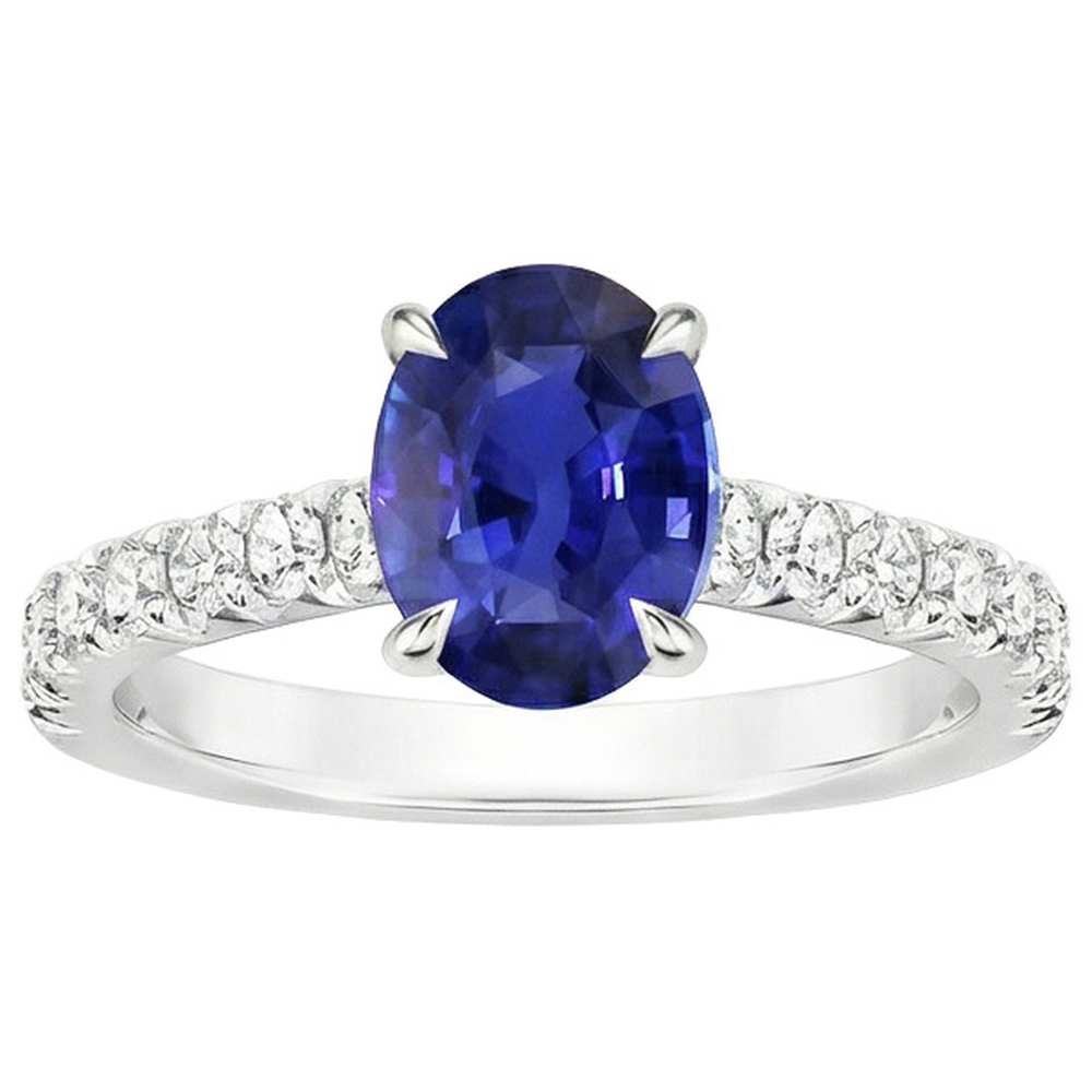 Anello solitario con zaffiro blu ovale a 4 carati e accenti di diamanti in oro bianco 14K