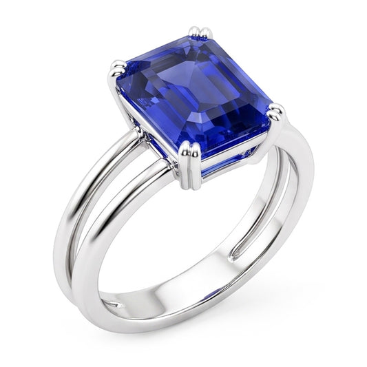 Anello solitario con zaffiro blu smeraldo a doppia punta con gambo diviso 2 carati