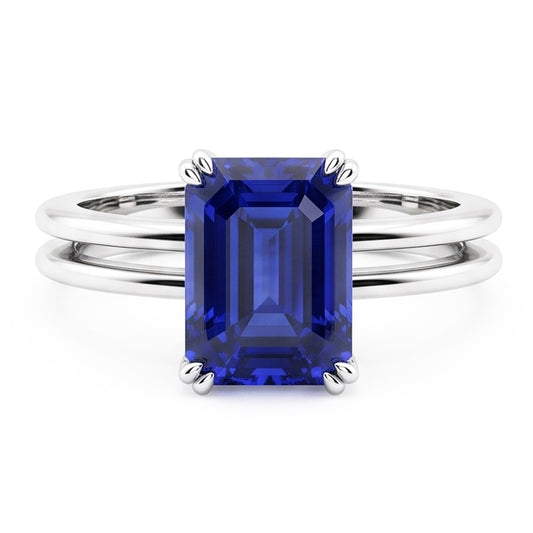 Anello solitario con zaffiro blu smeraldo a doppia punta con gambo diviso 2 carati