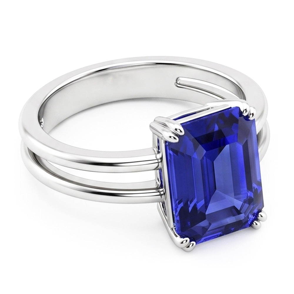Anello solitario con zaffiro blu smeraldo a doppia punta con gambo diviso 2 carati