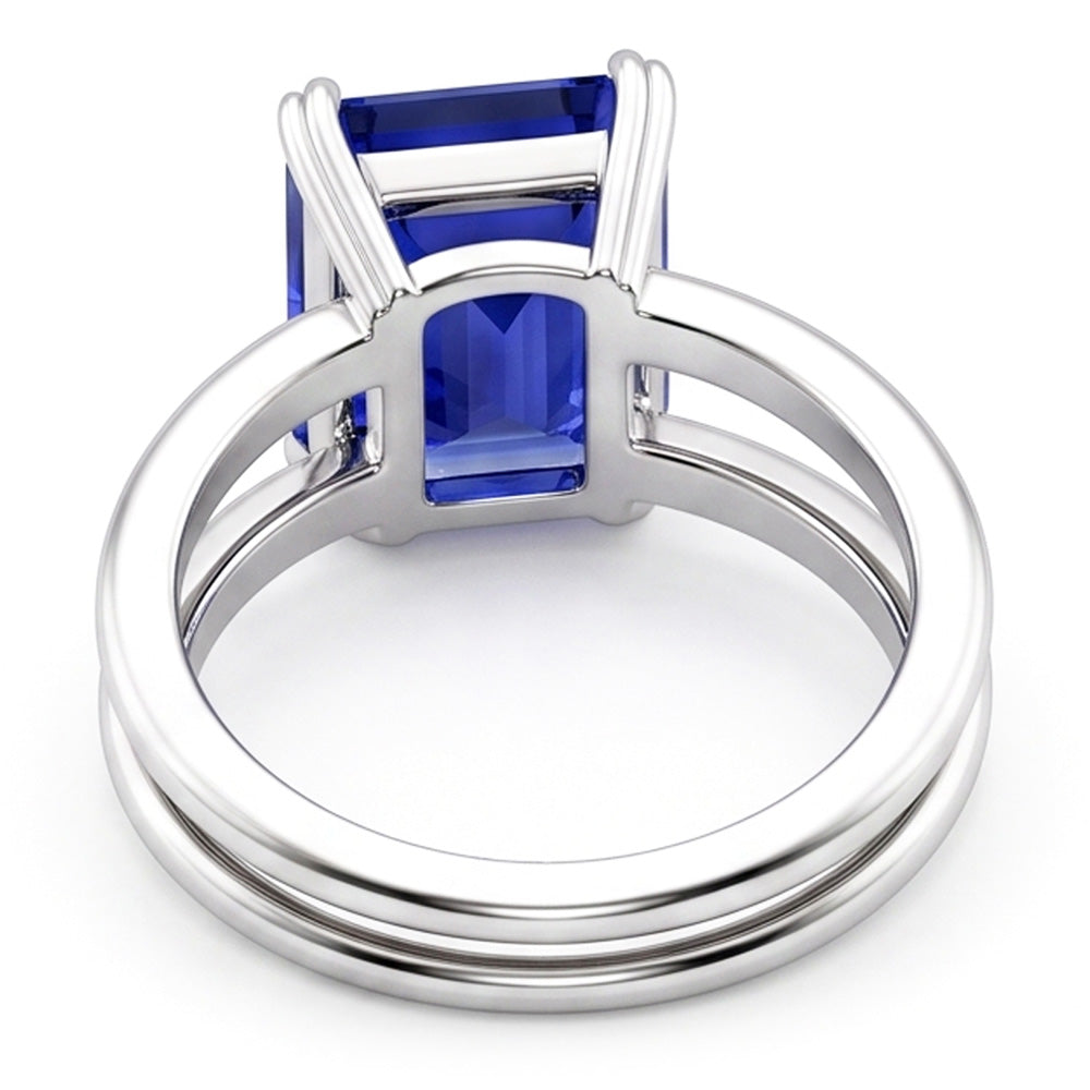Anello solitario con zaffiro blu smeraldo a doppia punta con gambo diviso 2 carati