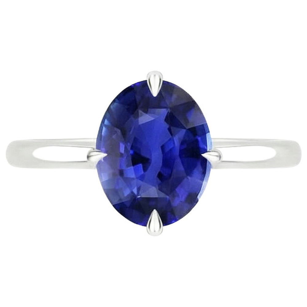 Anello solitario con zaffiro blu taglio ovale 3 carati incastonato