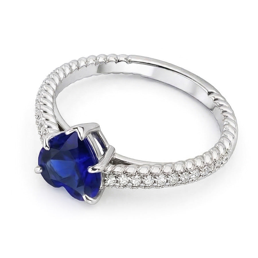 Anello solitario con zaffiro di Ceylon e pavé con accenti di diamanti 2.50 carati